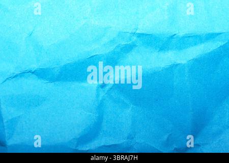 A textured blue surface creates an inviting and tranquil atmosphere. Stock Photo