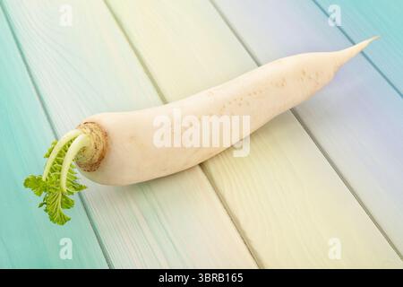daikon radish on wood background Stock Photo