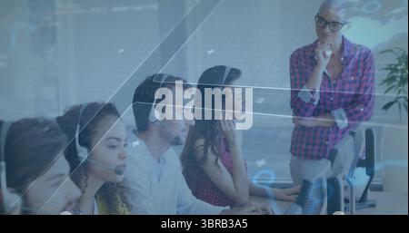 Call center agents wearing headsets focusing on computers in open office, with digital data overlay Stock Photo