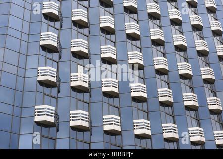 Exterior rows of white balconies on commercial building, Onyx Tower, Los Angeles, California, USA Stock Photo