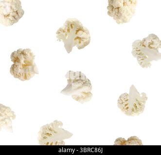 Fresh cauliflower florets falling on white background Stock Photo