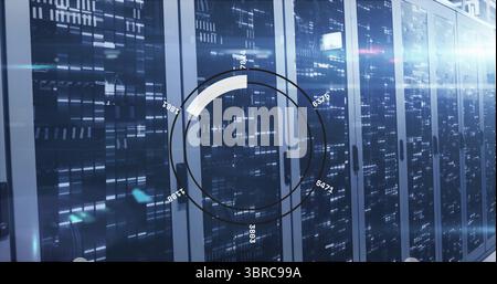 Network tech scanning server racks with tablet in data center corridor ...