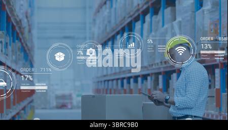Supervisor reviewing digital overlays on tablet in warehouse, with racks and pallets, copy space Stock Photo