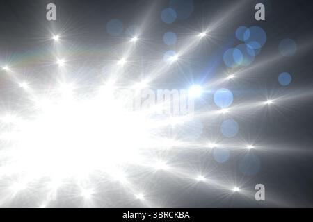Digital graphic is showing grid of white star flares with bluish bokeh rings on gray gradient Stock Photo