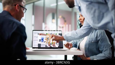 Multiracial Design Team Using CAD Software To Remodel Real Estate. Stock Photo