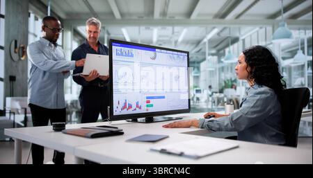 Analyzing Multicultural Data: A Diverse Team Predicts Business Performance Stock Photo