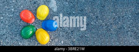 Banner Construction hard hat safety tools equipment for workers in construction site for engineering protection head standard. Panorama Many hard hat Stock Photo