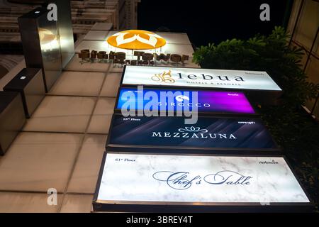 Sign of Lebua Hotel, Sirocco and two-Michelin-starred restaurants Mezzaluna and Chef's table situated in State Tower, Bang Rak, Bangkok, Thailand Stock Photo