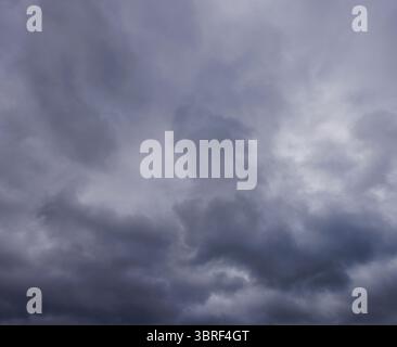 Grey rain clouds covering the sky , Finland Stock Photo