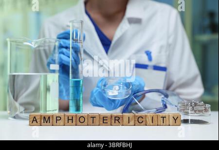 Exploring the concept of Amphotericity in Chemistry using various Laboratory Equipment and tools Stock Photo