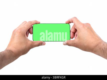 Man holding phone in hands, mockup for phone camera.Green screen and white background. Stock Photo