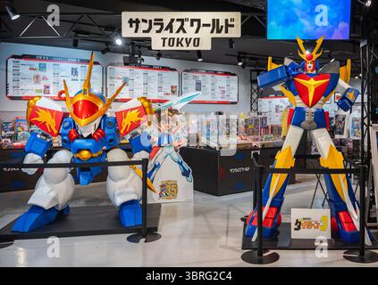 tokyo, ikebukuro - apr 16 2025: Sunrise World Tokyo free exhibit space in Bandai Namco Cross Store with life-sized robots from retro 90' anime Mashin Stock Photo