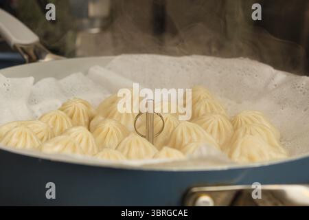 Steaming hot steamed dumplings cooked at home Stock Photo