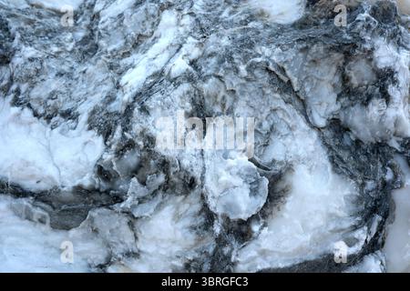 This breathtaking stone displays intricate patterns and stunning hues of gray. Stock Photo