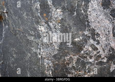 The surface showcases stunning textures and unique colors of rock. Stock Photo