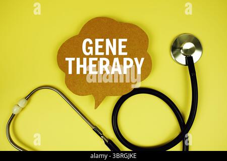 Gene Therapy text message on speech bubble with stethoscope on yellow background Stock Photo