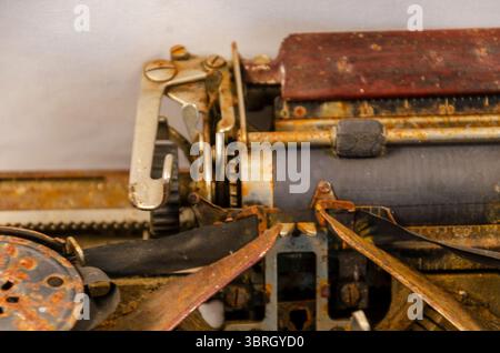 Close up of the carriage mechanism of an old rusty typewriter Stock Photo