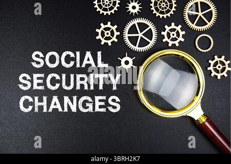 Social Security Changes text message with magnifying glass on black background Stock Photo