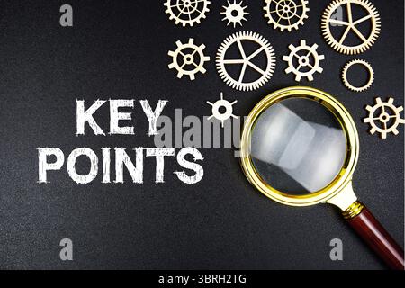 Key Points text message with magnifying glass on black background Stock Photo