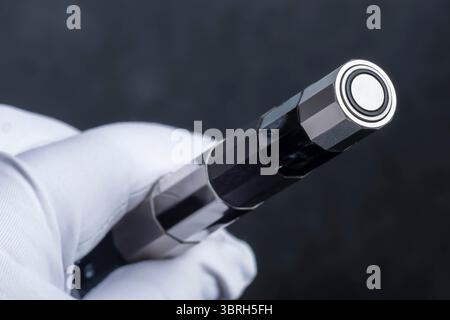 Branded pen with ink and nib in a box. Gift set. Selective focus. Office interior. Stock Photo