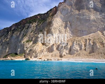 Scenic Mizithres Beach coastline seen from the sea on Zakynthos Island, Greece. Ideal for Mediterranean travel and nature themes. Stock Photo