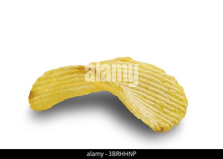 Closeup view of single dry crispy salted potato chip isolated on white background with clipping path Stock Photo