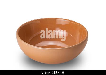 Empty brown ceramic bowl isolated on white background with clipping path. High angle view of brown ceramic bowl Stock Photo