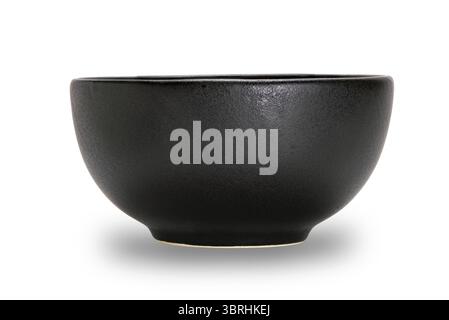 Empty single black ceramic bowl isolated on white background with clipping path, side view, closeup, horizontal format Stock Photo