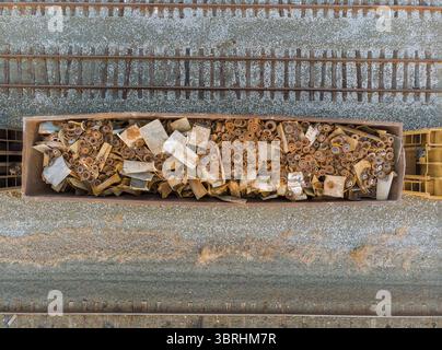 Scrap metal iron from many things in wagons old rusty corroded metal Stock Photo