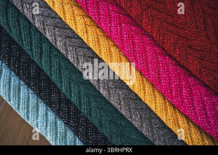 Multi colored Knitted woolen fabric texture background for winter Stock Photo