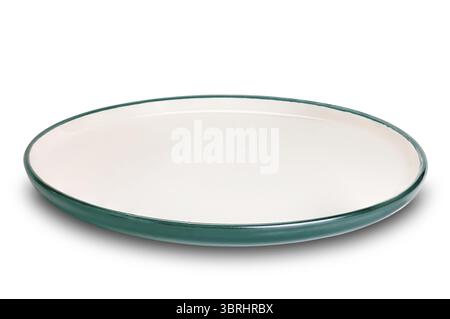 Empty green cersmic plate with green edge. View of green ceramic plate isolated on white background with clipping path Stock Photo