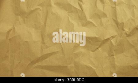 Recycle Paper Texture background. Crumpled Old kraft paper abstract shape background with space Yellow crumpled paper for text high resolution Stock Photo