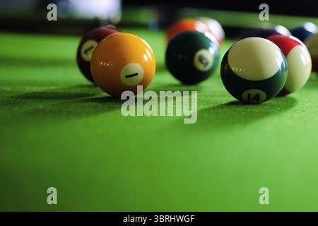 Billiard balls. Colorful snooker balls on green frieze Stock Photo
