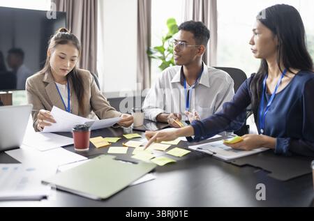 Business asian Multicultural businesspeople working project working together in office conference ideas in startup at office Diversity leadership and Stock Photo