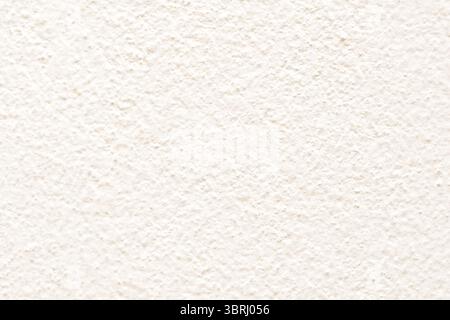 Abstract texture of old painted white color stone concrete wall at rural house. Blank rough surface texture of concrete wall background Stock Photo