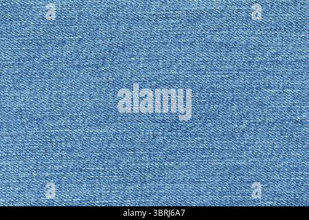 Top view of denim jeans texture background. Canvas blue denim cloth fabric textile use as background Stock Photo