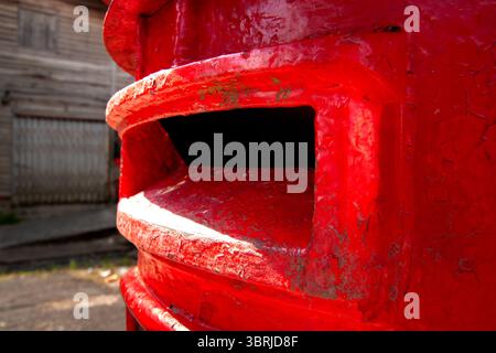 A Vibrant Red Royal Mail Post Box Stock Photo