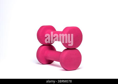 pink dumbbells isolated on white background Stock Photo