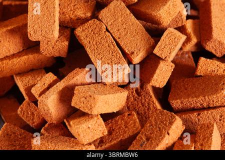 Pile of bricks close up. Construction background Stock Photo