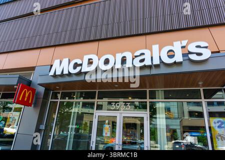 CALGARY, CANADA - JUNE 10, 2025: McDonald's Restaurant at University District in Calgary. The famous American fast food company was founded in 1940. Stock Photo