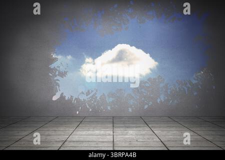 Splash on wall revealing cloud in sky Stock Photo