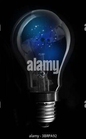 Single incandescent light bulb is glowing with blue filament in dark studio 3D render, glass detail Stock Photo