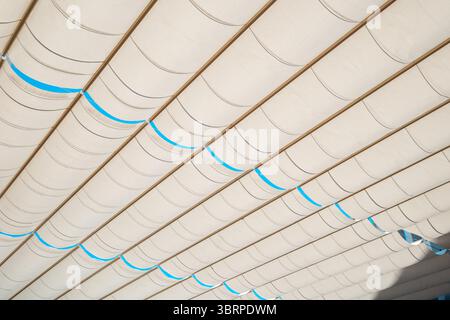 Contemporary Shade Structure, Curved Fabric Panels architecture shade ceiling design , modern contemporary roof design Stock Photo