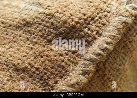 Close up textured abstract background of a brown hessian bag Stock Photo