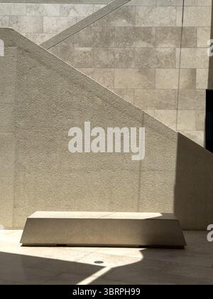 stone wall background with light and shadow patterns- Vertical background Stock Photo