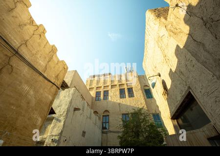 Authentic Sand-Colored Architecture with blue sky, Old town Architecture with Cultural Heritage vibe Stock Photo
