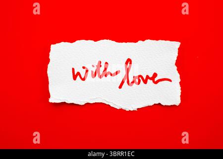 with love I handwritten love tag isolated on red background, red background wallpaper for Valentine's day greeting card, red love poster Stock Photo