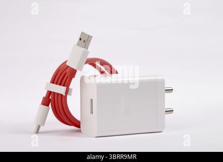 Efficiently power your devices with this fast-charging USB wall adapter and durable red Type-C cable. Compact, safe, and ideal for smartphones, tablet Stock Photo