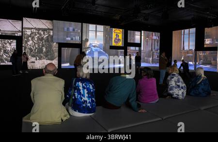 UK, England, Salford, MediaCityUK, visitors in NPG, Stories Brought to Life experience, Mary Secole sequence Stock Photo