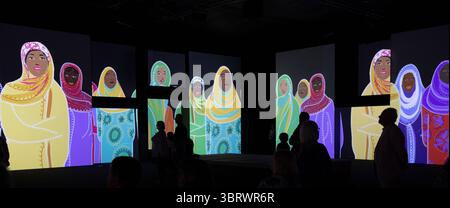 UK, England, Salford, MediaCityUK, visitors in NPG, Stories Brought to Life experience, Malala Yousafzai sequence Stock Photo